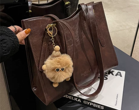 ?秋冬复古大容量包包2023新款女包流行通...