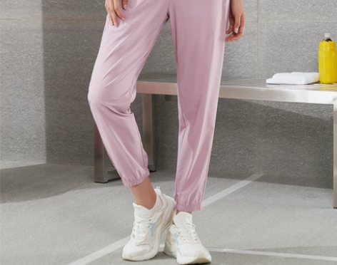 特步女梭织九分裤2022夏季新款跑步收口运...