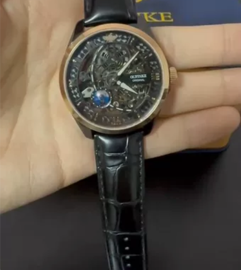 出一块闲置机械手表，中间的地球仪可以转的 ...