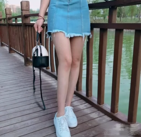 春秋高腰不规则牛仔半身裙女流苏韩版学生A字...