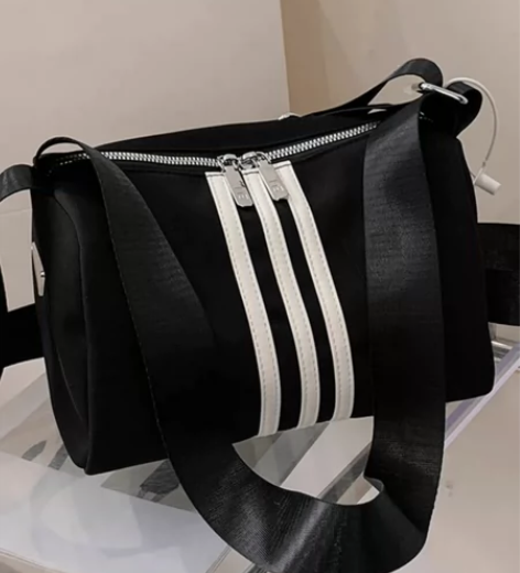 全新转小众防水大容量休闲背包2023新款斜...