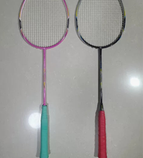 羽毛球拍 双人情侣拍带球拍袋一个不怎么玩了...