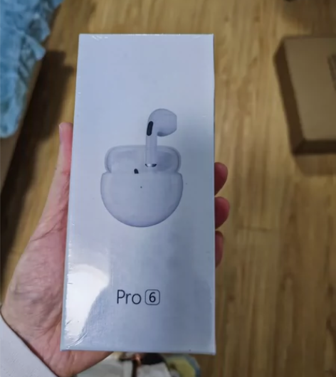 买荣耀手机店铺送的耳机，不知道什么品牌，店...