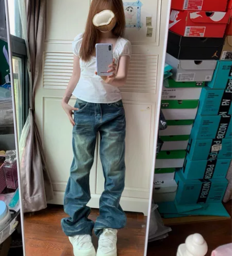 出一条牛仔裤 s码的 裤子很长 喜欢拖地效...