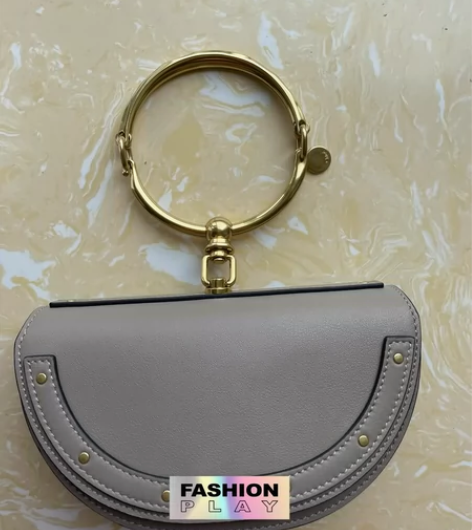 包邮月牙包灰色系女生手提包高级秀场圆环女包...