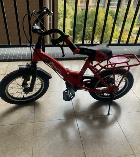 闲置凤凰14寸儿童折叠自行车，成色如图，左...