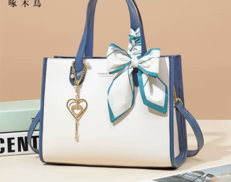 啄木鸟女包2023新款时尚斜挎包高级感真皮...