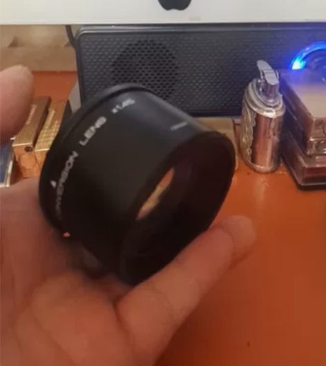 肯高一款相机附件，怎么用本人不懂，镜片有微...