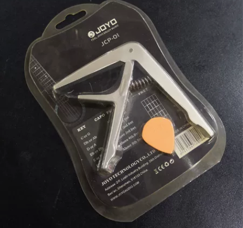 吉他变调夹，附带拨片。使用方便好用！ 感兴...