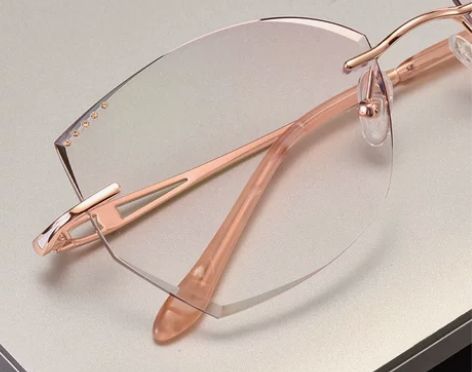 莫泊桑2019新款无框眼镜女镶钻纯钛超轻猫...