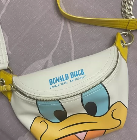 不莱玫包包女正版迪士尼唐老鸭斜跨胸包网红潮...