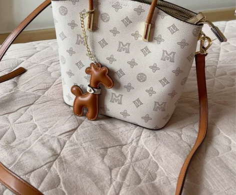 稻草人女包单肩包秋冬水桶包女小包时尚百搭斜...