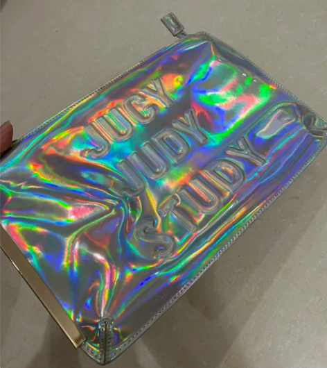 Jucy Judy手拿包 潮酷 购于西湖银...