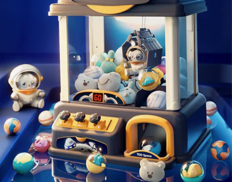 儿童抓娃娃机夹公仔投币小型家用迷你扭蛋机男...