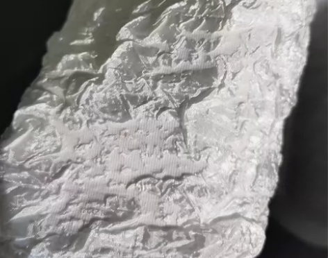 立体重肌理岩石纹不规则压褶黑白弹力外套服装...