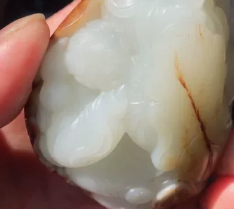 和田玉籽料红皮巧雕、合欢二仙、二百多克、喜...