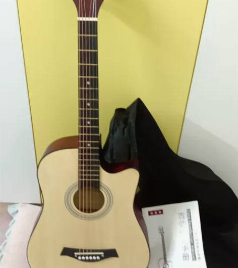 出民谣吉他36或38寸，没有用过，吉他套和...
