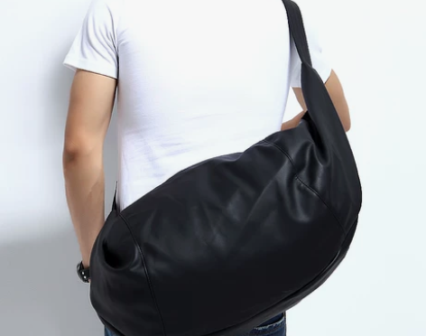 男包休闲单肩斜挎包韩版时尚男士旅行水桶饺子...