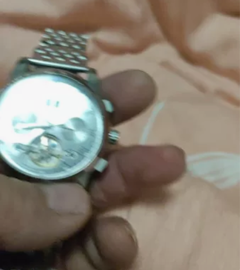 全自动双历机械手表,配钢带皮带,二手使用中...