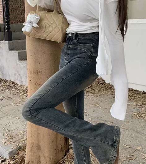 复古做旧马蹄牛仔裤女装秋季紧身直筒微喇叭长...