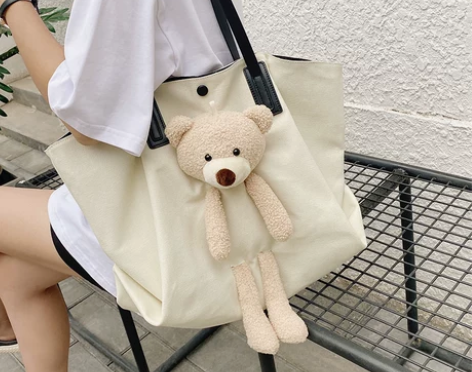 今年流行的网红可爱小熊包学生帆布大包包20...