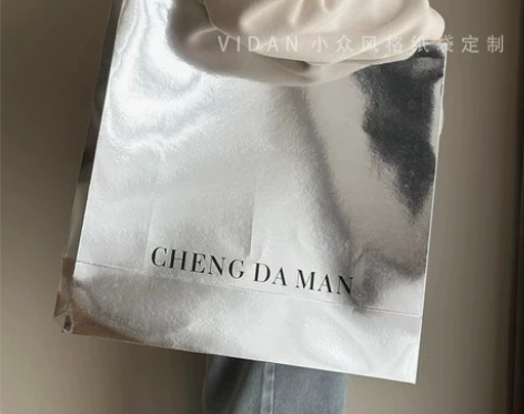 服装店手提袋定制银色亮面纸袋订做童装袋子