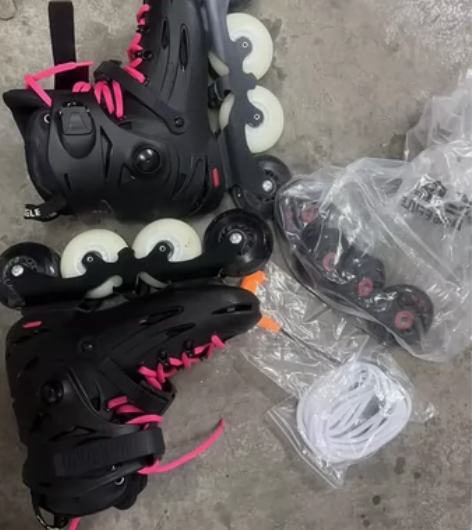 f5s轮滑鞋，给女朋友买的黑粉的，大概有半...