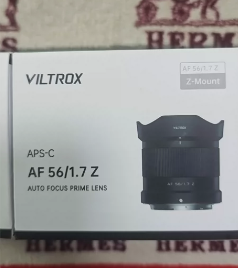 唯卓士618购买，56mm f1.7 尼康...