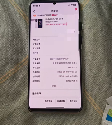 ?用了9个月的红米K60白色手机，配置16...