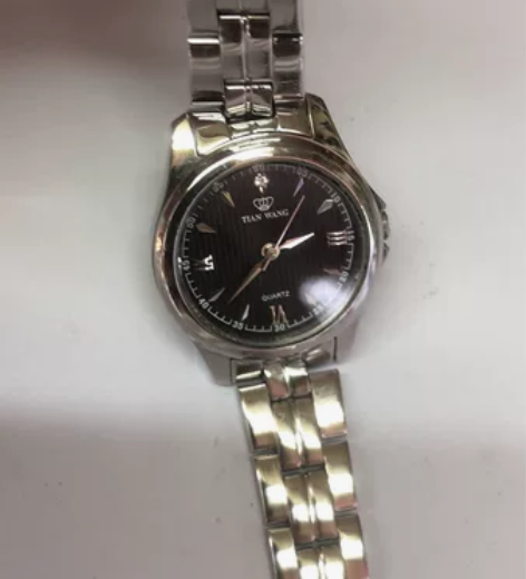 女款天王石英女表，表径25毫米。成色如图，...