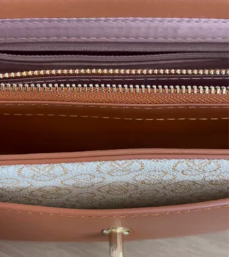 专柜正品百搭时尚欧美女包，朋友送的，不适合...