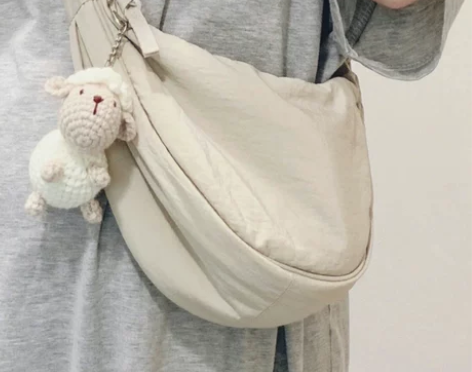 u家饺子包女斜挎腋下小号高级感同款百搭优家...