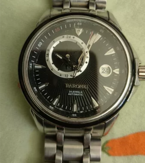 雷诺全自动男手表,后面还有孙红雷名字。走时...