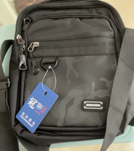 冠翀箱包 男士小包 斜挎包 多功能男包韩版...