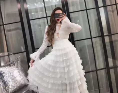 2018春装性感低V领收腰大摆小香风层层蛋...