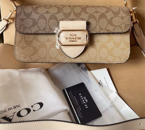 蔻驰女士手提斜挎小方包酒神包morgan系...