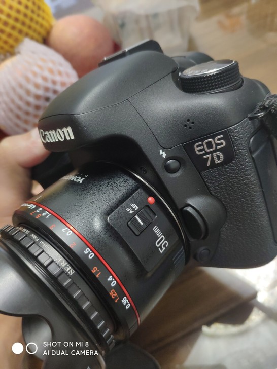佳能7D+永诺50 1.8二代套机,成色9...