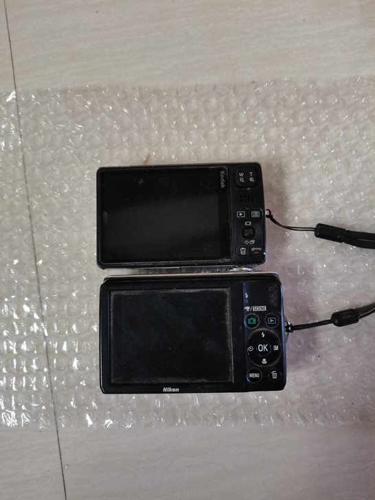 尼康数码相机 柯达 都不开机,不知道什...