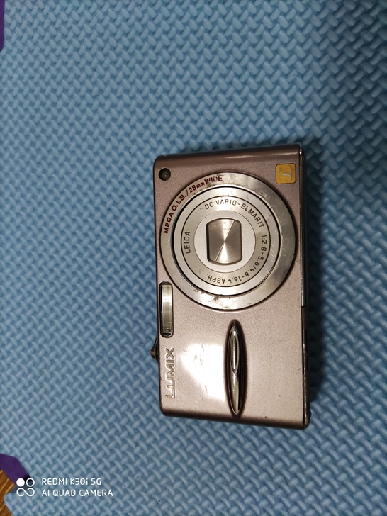 松下dmc-fx30gk数码相机，实物如图...