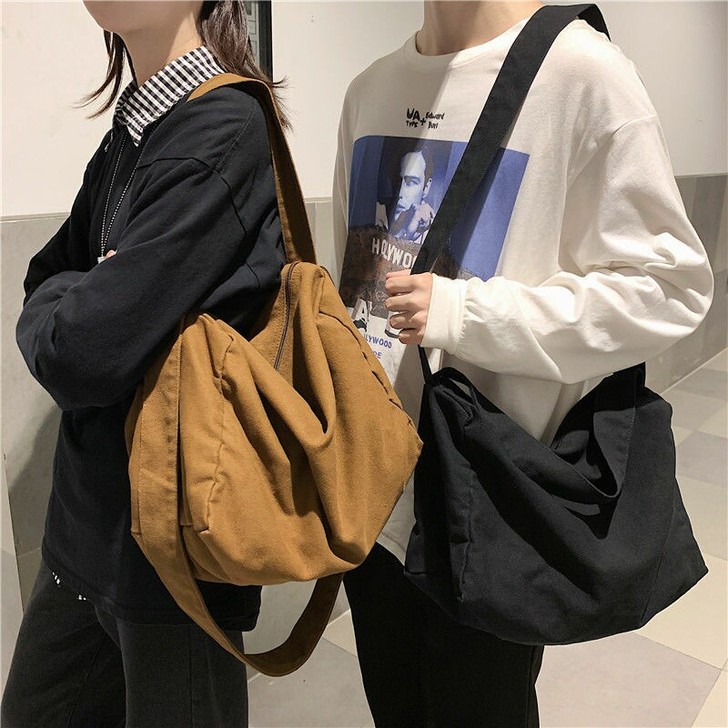 港风斜挎包男士帆布单肩包女生休闲百搭背包2...