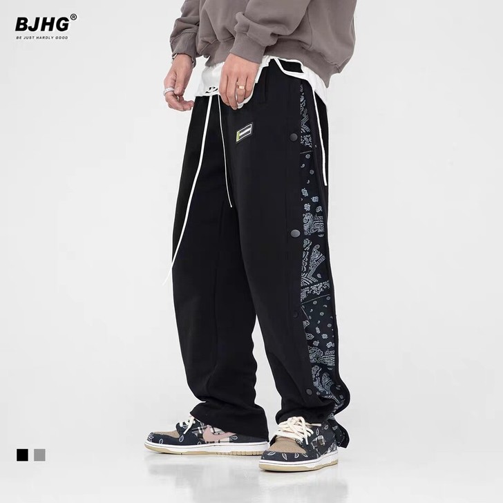 BJHG 春季侧边排扣拼接腰果花休闲卫裤男...