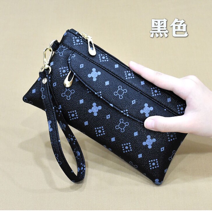 2021新款韩版时尚手拿包女潮流百搭印花手...