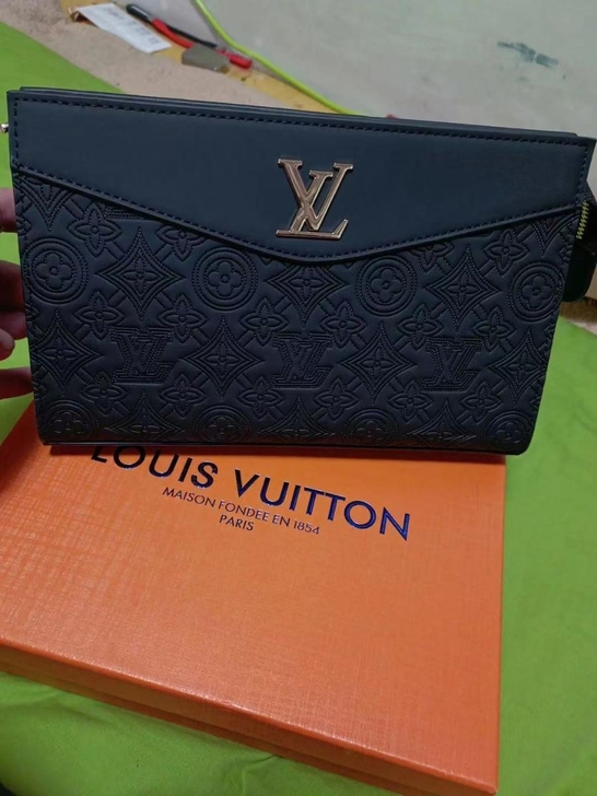 新款男士真皮手拿包商务牛皮大容量手抓包男包...