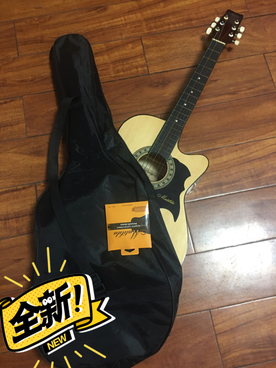 全新的酷臣吉他，放的时间有点久了，可以正常...