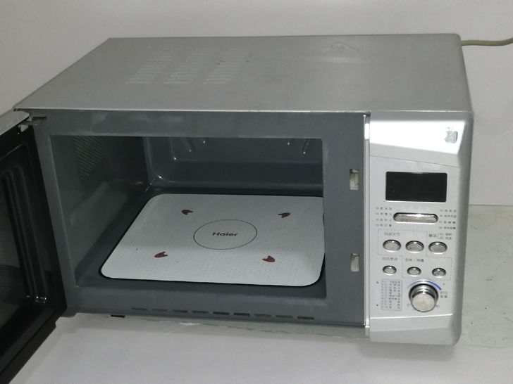 海尔微波炉，平板式，智能操作数码显示，光波...