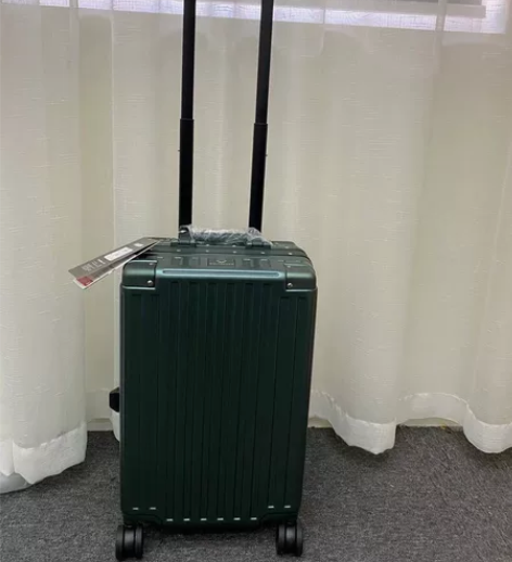 全新漫游铝框旅行箱，20寸墨绿色，静音万向...