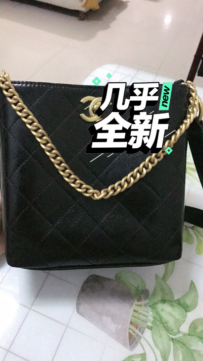 真皮水桶包包时尚某香风菱格链条包大容量手提...