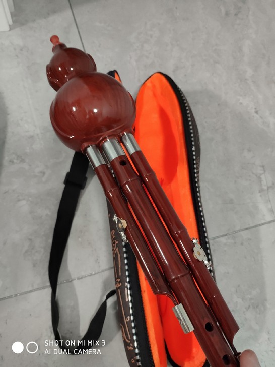 全新塑钢C调葫芦丝拿回来备用的！结果没用上...