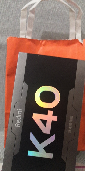 红米k40，亲戚送给小孩的，不想让小孩用手...