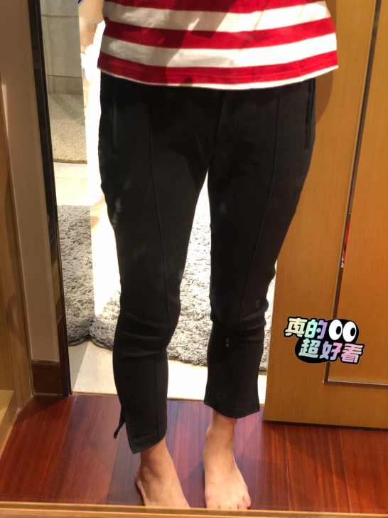 黑色 纯棉 修身七分长裤 八成新 裤腿处带...